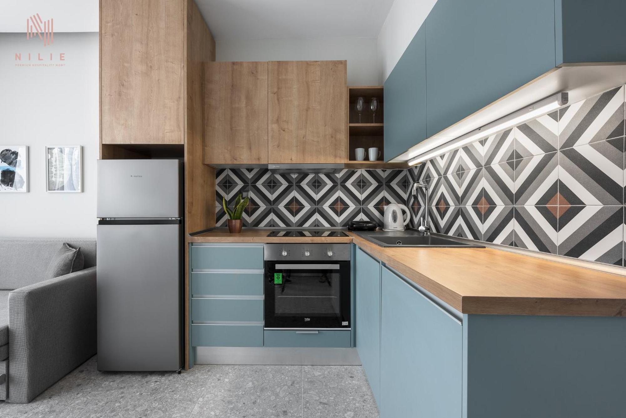 Avenue & Apartments, Nilie Hospitality Mgmt Apartment